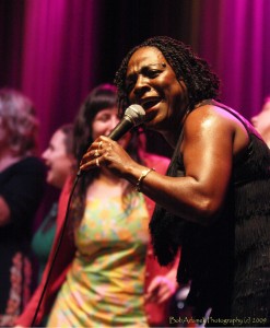 Sharon Jones dancing with some ladies she invited up on stage