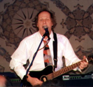 Electric, acoustic or electric/acoustic as pictured, makes no difference to Belew... Photo courtesy Coming Age