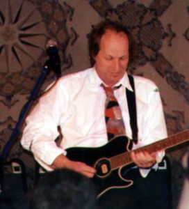 ... Belew can wail and burn on any form of guitar! Photo courtesy Coming Age